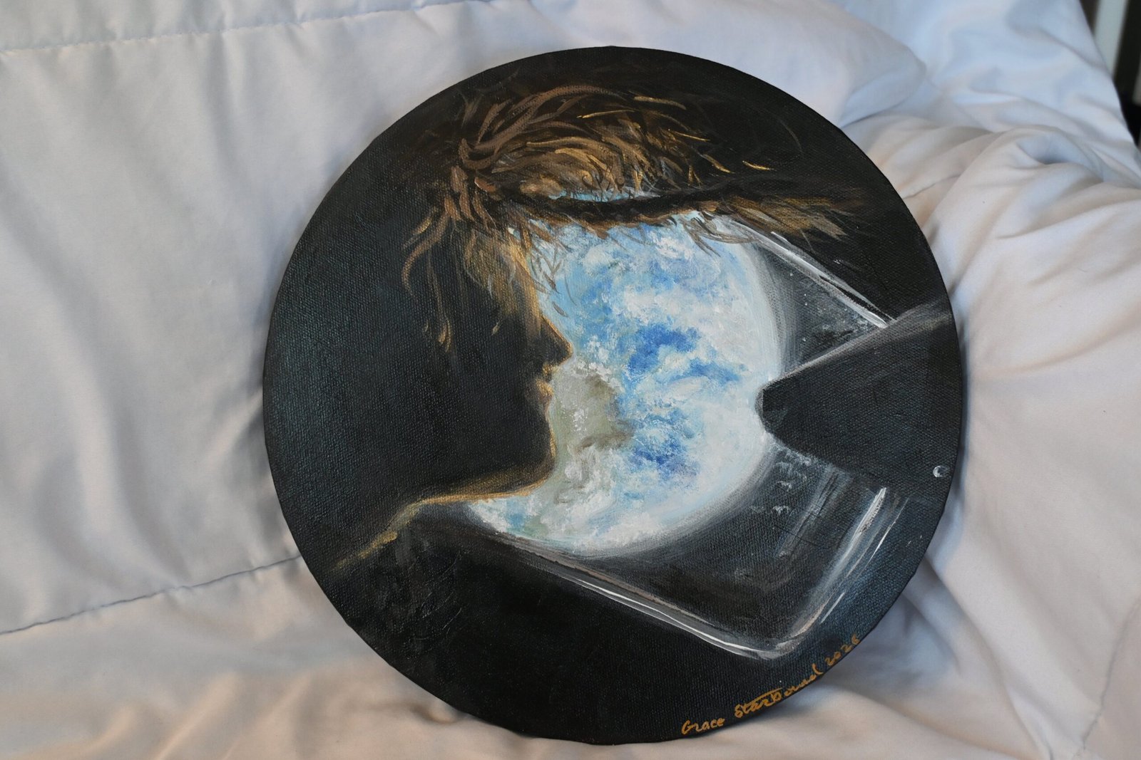 A canvas painting of a woman in space