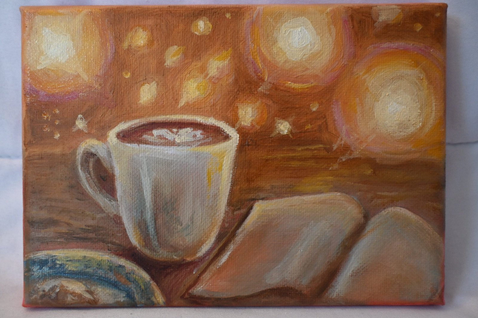 Mug painting a canvas painting of a mug next to an open book