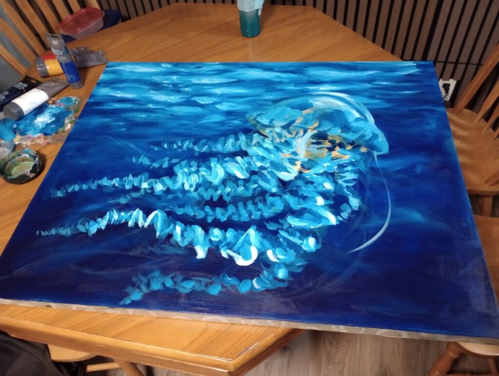 the start of a jellyfish canvas painting